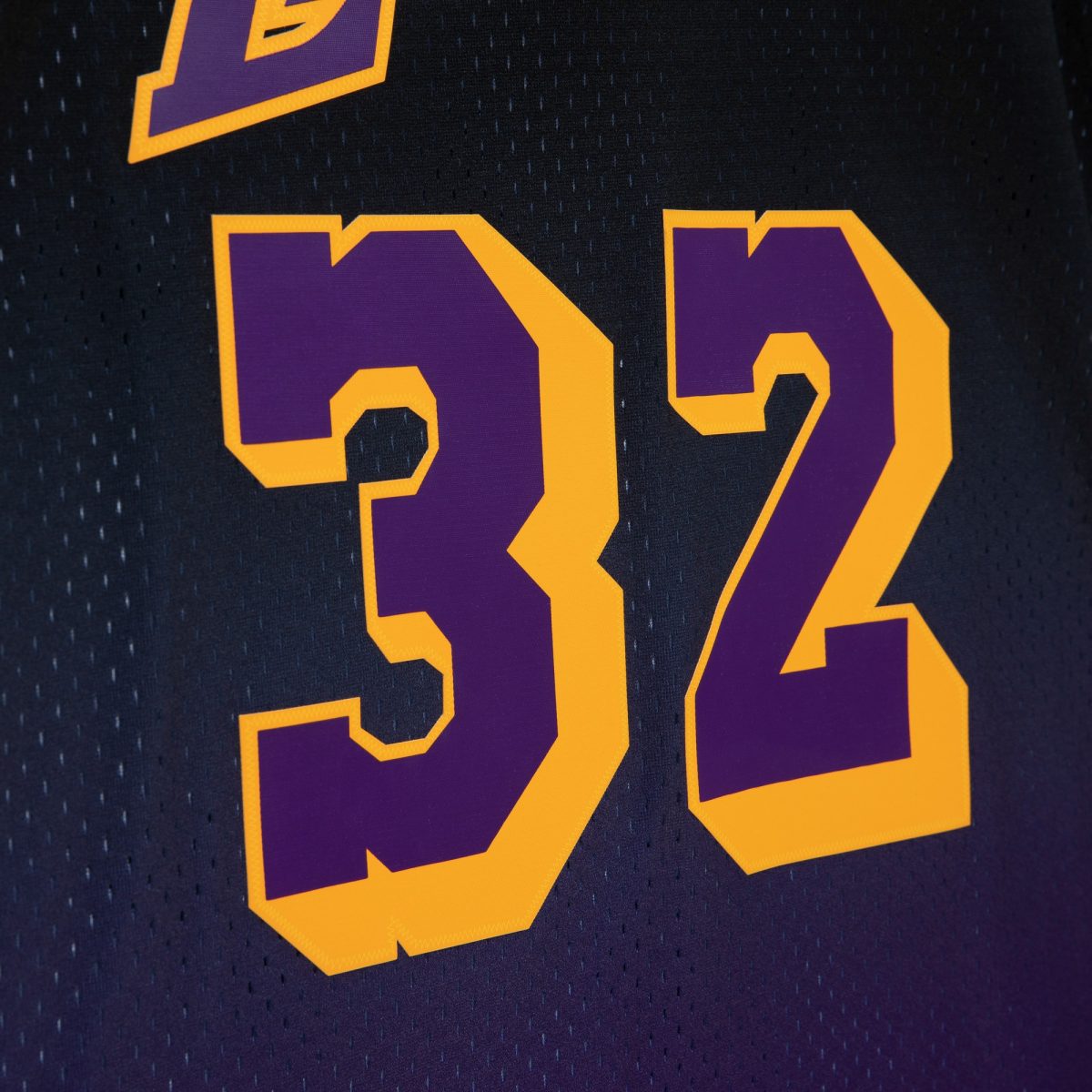Official Los Angeles Lakers mens los angeles lakers magic johnson mitchell  ness purpleblack 198485 hardwood classics fadeaway swingman player jersey | Lakers Shop