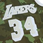 Official Los Angeles Lakers mens los angeles lakers shaquille oneal mitchell  ness camo hardwood classics 199697 ghost green swingman jersey | Lakers Shop