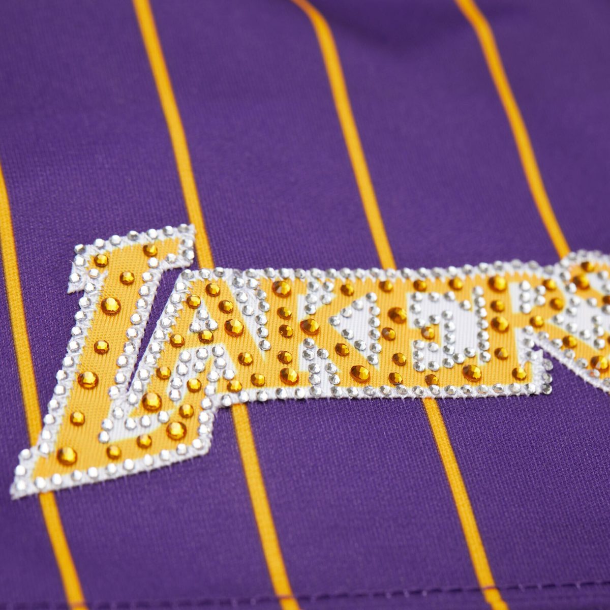 Official Los Angeles Lakers womens los angeles lakers magic johnson mitchell  ness x dannijo purple cropped football fashion jersey 202757162 | Lakers Shop