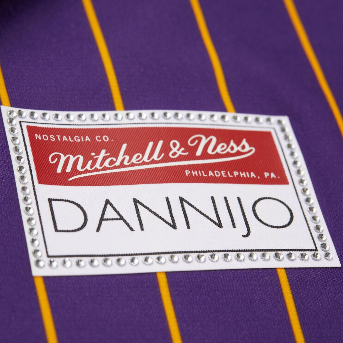 Official Los Angeles Lakers womens los angeles lakers magic johnson mitchell  ness x dannijo purple cropped football fashion jersey 202757162 | Lakers Shop