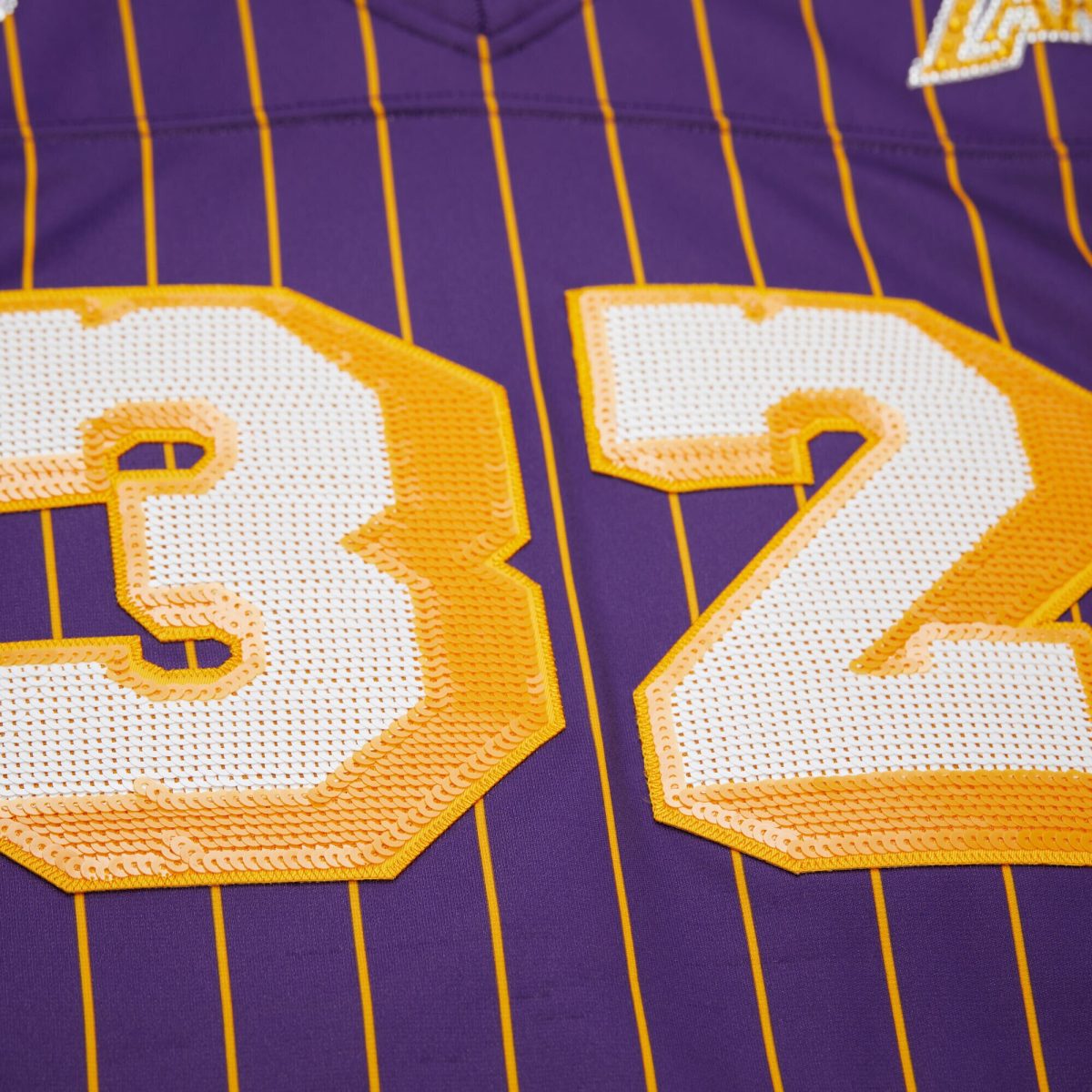 Official Los Angeles Lakers womens los angeles lakers magic johnson mitchell  ness x dannijo purple cropped football fashion jersey | Lakers Shop