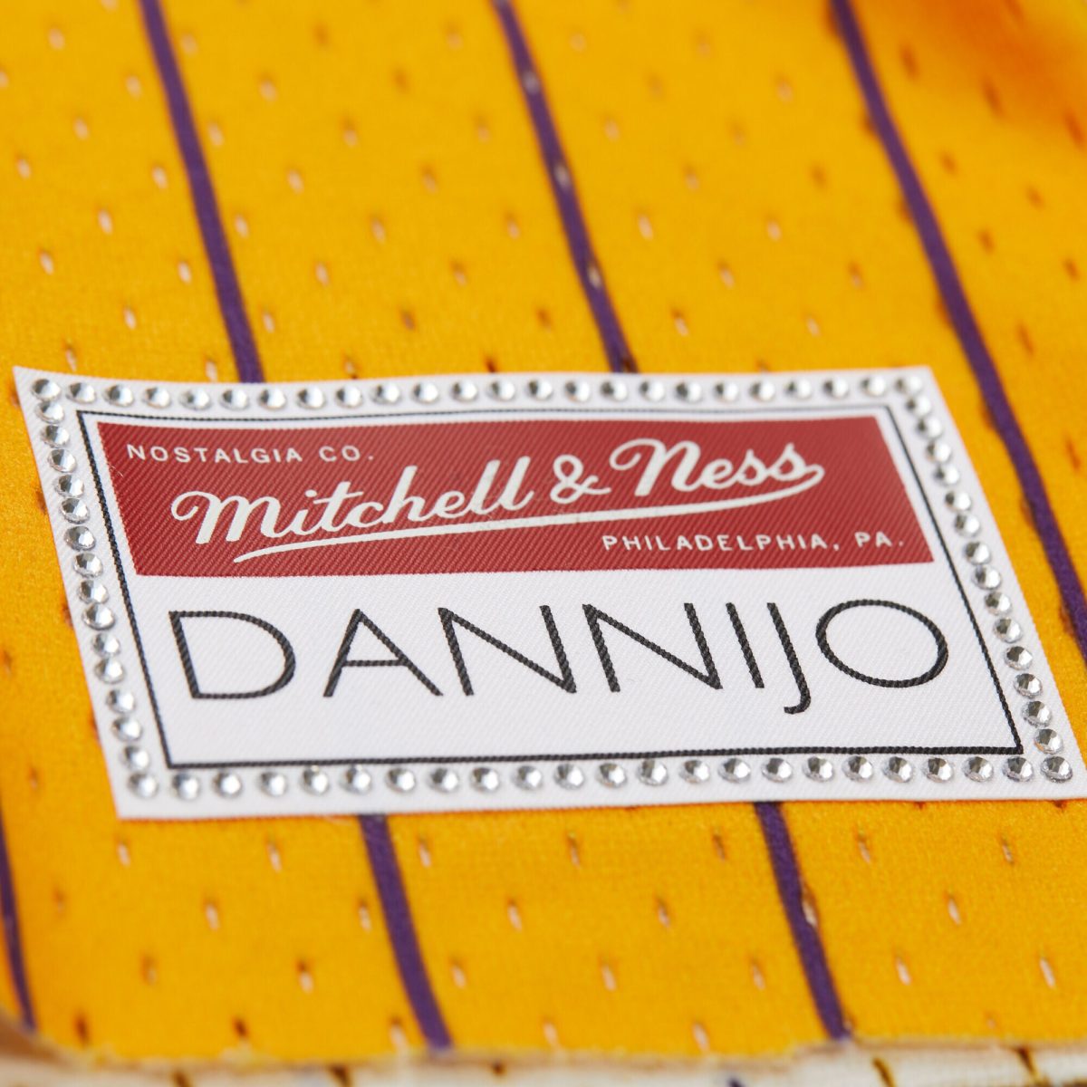 Official Los Angeles Lakers womens los angeles lakers magic johnson mitchell  ness x dannijo yellow fashion cropped basketball jersey | Lakers Shop