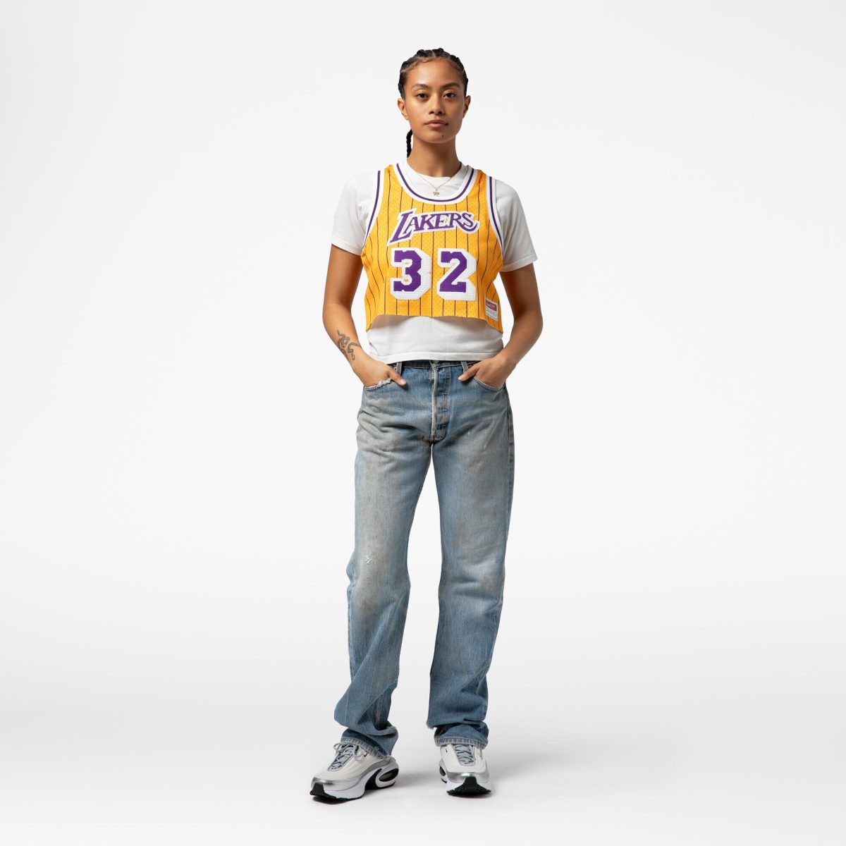 Official Los Angeles Lakers womens los angeles lakers magic johnson mitchell  ness x dannijo yellow fashion cropped basketball jersey | Lakers Shop