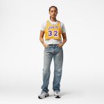 Official Los Angeles Lakers womens los angeles lakers magic johnson mitchell  ness x dannijo yellow fashion cropped basketball jersey | Lakers Shop